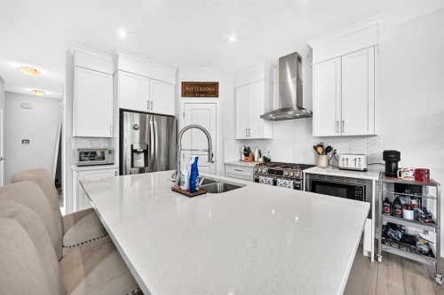 118 Belmont Crescent Sw, Calgary, AB - Indoor Photo Showing Kitchen With Double Sink With Upgraded Kitchen