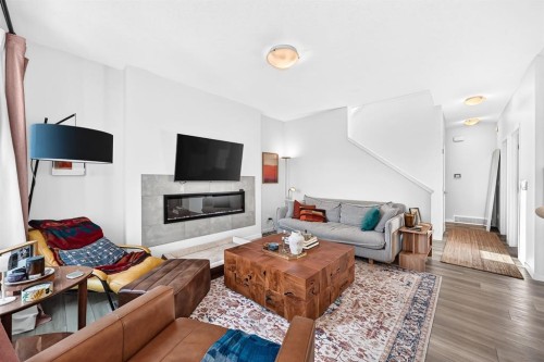 118 Belmont Crescent Sw, Calgary, AB - Indoor Photo Showing Living Room With Fireplace