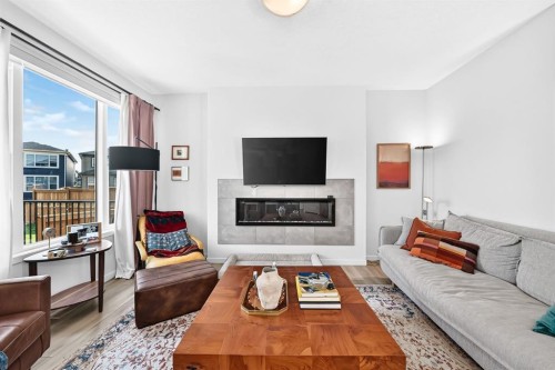 118 Belmont Crescent Sw, Calgary, AB - Indoor Photo Showing Living Room With Fireplace