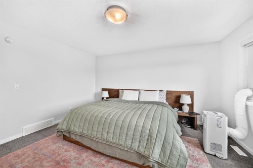118 Belmont Crescent Sw, Calgary, AB - Indoor Photo Showing Bedroom