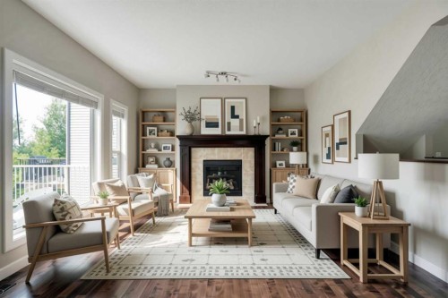 92 Everglen Close Sw, Calgary, AB - Indoor Photo Showing Living Room With Fireplace