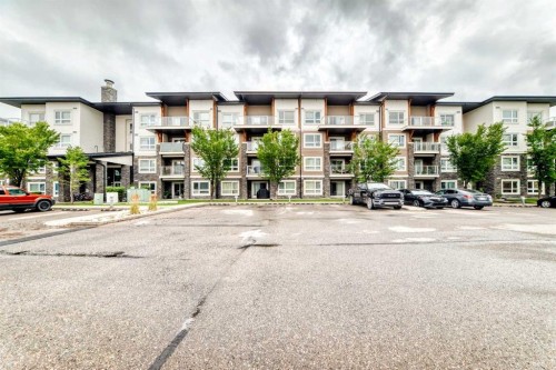 1411-240 Skyview Ranch Road Ne, Calgary, AB - Outdoor With Balcony With Facade