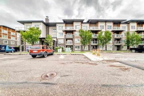 1411-240 Skyview Ranch Road Ne, Calgary, AB - Outdoor With Balcony With Facade