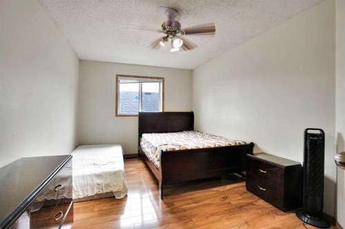 28 Martinridge Road Ne, Calgary, AB - Indoor Photo Showing Bedroom