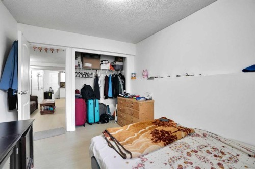 28 Martinridge Road Ne, Calgary, AB - Indoor Photo Showing Bedroom