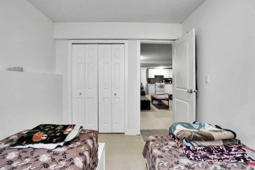 28 Martinridge Road Ne, Calgary, AB - Indoor Photo Showing Bedroom