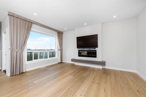 171 Corner Glen Grove Ne, Calgary, AB - Indoor Photo Showing Living Room With Fireplace
