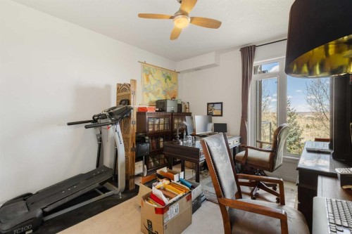 304-8 Hemlock Crescent Sw, Calgary, AB - Indoor Photo Showing Gym Room