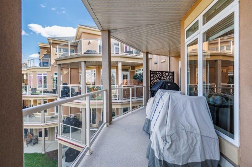 304-8 Hemlock Crescent Sw, Calgary, AB - Outdoor With Deck Patio Veranda With Exterior