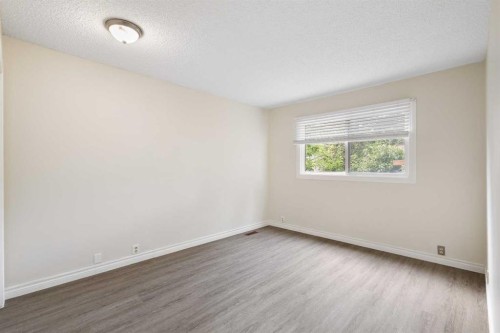13 Bernard Drive Nw, Calgary, AB - Indoor Photo Showing Other Room