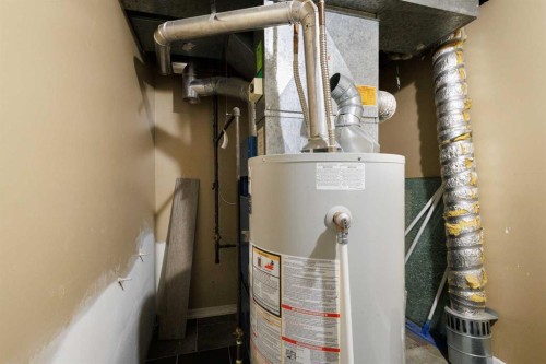 13 Bernard Drive Nw, Calgary, AB - Indoor Photo Showing Basement