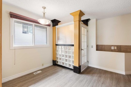 13 Bernard Drive Nw, Calgary, AB - Indoor Photo Showing Other Room