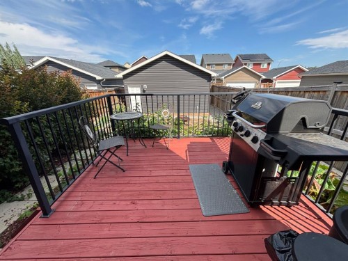 12 Fireside Bend, Cochrane, AB - Outdoor With Deck Patio Veranda With Exterior