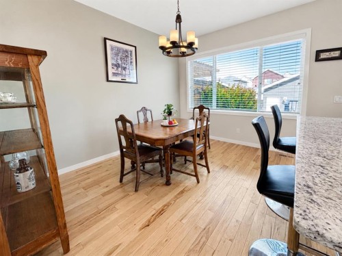 12 Fireside Bend, Cochrane, AB - Indoor Photo Showing Dining Room