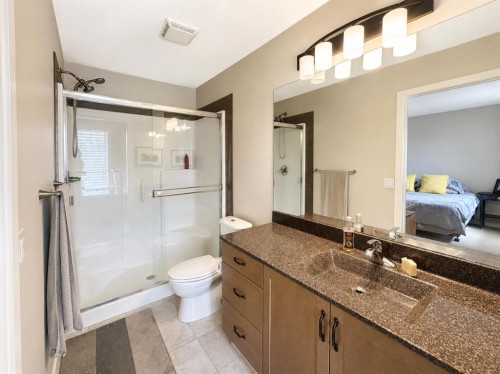 12 Fireside Bend, Cochrane, AB - Indoor Photo Showing Bathroom