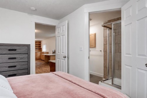 56 Spring Dale Circle Se, Airdrie, AB - Indoor Photo Showing Bedroom