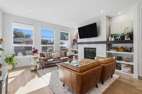 3308 2 Street Nw, Calgary, AB - Indoor Photo Showing Living Room With Fireplace