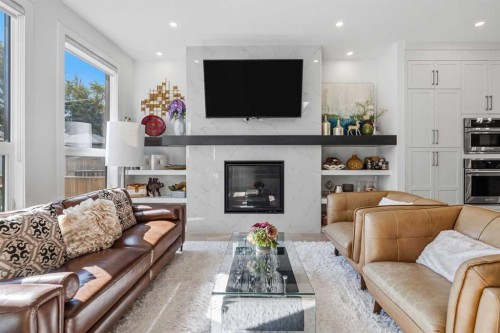 3308 2 Street Nw, Calgary, AB - Indoor Photo Showing Living Room With Fireplace