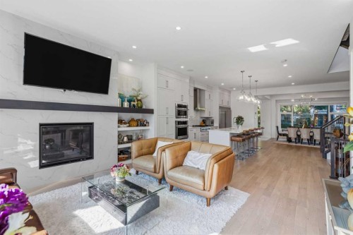 3308 2 Street Nw, Calgary, AB - Indoor Photo Showing Living Room With Fireplace