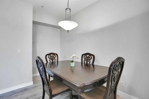5-148 Rockyledge View Nw, Calgary, AB - Indoor Photo Showing Dining Room