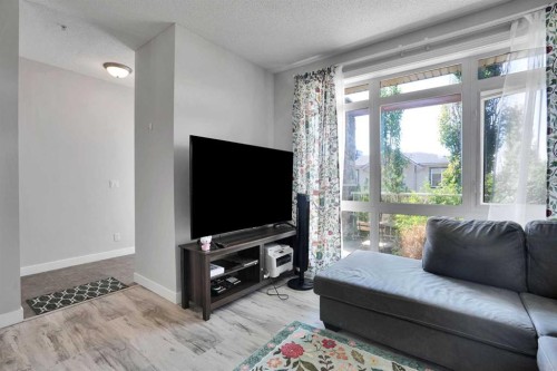5-148 Rockyledge View Nw, Calgary, AB - Indoor Photo Showing Living Room