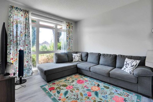 5-148 Rockyledge View Nw, Calgary, AB - Indoor Photo Showing Living Room