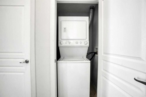 5-148 Rockyledge View Nw, Calgary, AB - Indoor Photo Showing Laundry Room