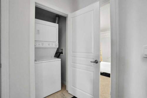 5-148 Rockyledge View Nw, Calgary, AB - Indoor Photo Showing Laundry Room