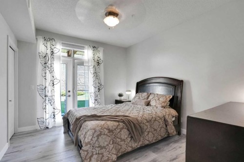 5-148 Rockyledge View Nw, Calgary, AB - Indoor Photo Showing Bedroom