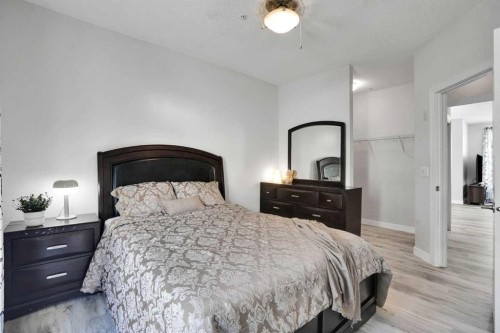 5-148 Rockyledge View Nw, Calgary, AB - Indoor Photo Showing Bedroom