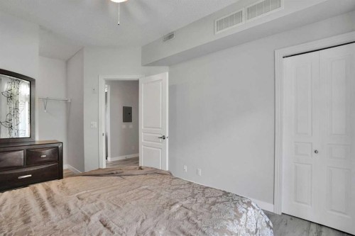 5-148 Rockyledge View Nw, Calgary, AB - Indoor Photo Showing Bedroom