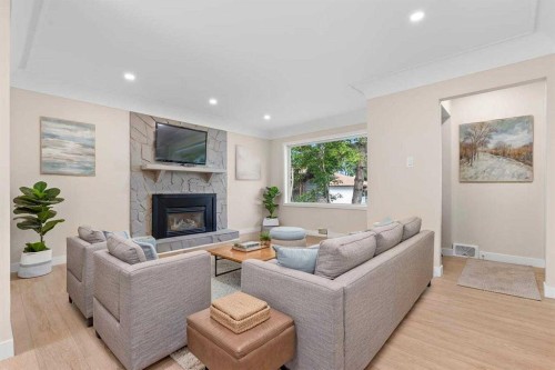 2007 Cottonwood Crescent Se, Calgary, AB - Indoor Photo Showing Living Room With Fireplace