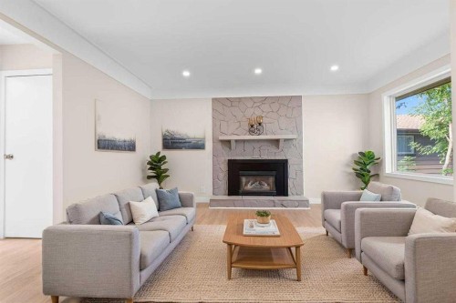 2007 Cottonwood Crescent Se, Calgary, AB - Indoor Photo Showing Living Room With Fireplace