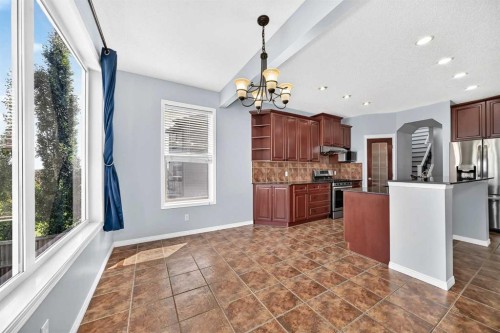 214 Royal Birch Heath Nw, Calgary, AB - Indoor Photo Showing Kitchen With Upgraded Kitchen