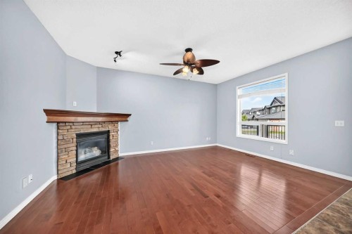 214 Royal Birch Heath Nw, Calgary, AB - Indoor With Fireplace