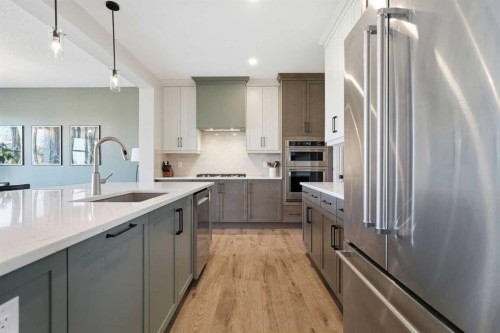 129 Wolf Hollow Villas Se, Calgary, AB - Indoor Photo Showing Kitchen With Upgraded Kitchen