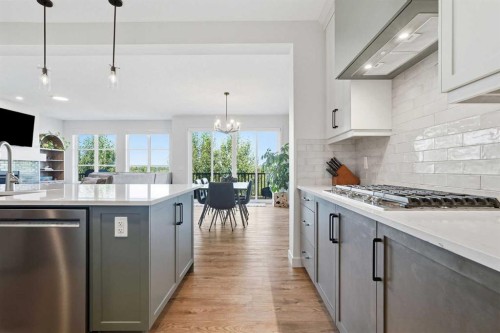 129 Wolf Hollow Villas Se, Calgary, AB - Indoor Photo Showing Kitchen With Upgraded Kitchen