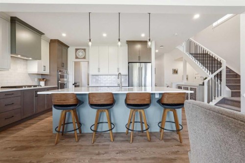 129 Wolf Hollow Villas Se, Calgary, AB - Indoor Photo Showing Kitchen With Upgraded Kitchen