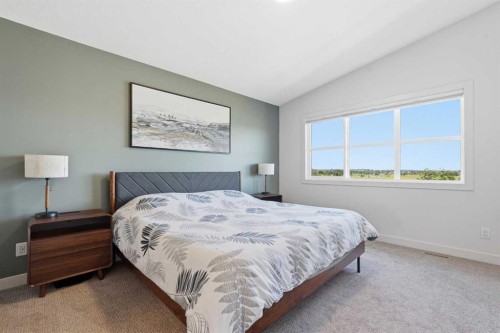 129 Wolf Hollow Villas Se, Calgary, AB - Indoor Photo Showing Bedroom