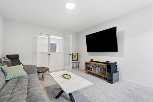 129 Wolf Hollow Villas Se, Calgary, AB - Indoor Photo Showing Living Room
