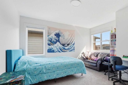 129 Wolf Hollow Villas Se, Calgary, AB - Indoor Photo Showing Bedroom