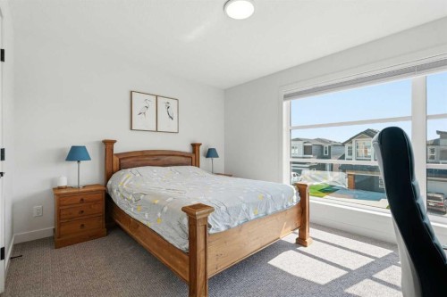 129 Wolf Hollow Villas Se, Calgary, AB - Indoor Photo Showing Bedroom