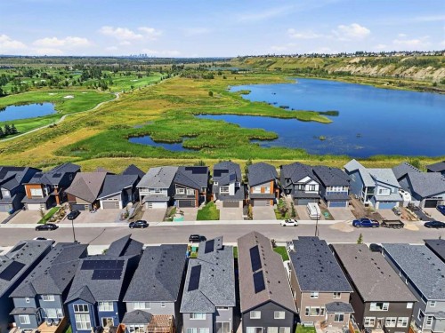 129 Wolf Hollow Villas Se, Calgary, AB - Outdoor With Body Of Water With View