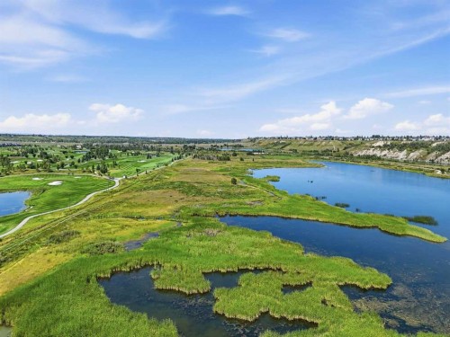 129 Wolf Hollow Villas Se, Calgary, AB - Outdoor With Body Of Water With View