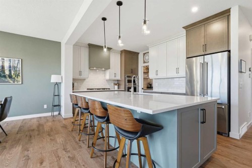 129 Wolf Hollow Villas Se, Calgary, AB - Indoor Photo Showing Kitchen With Upgraded Kitchen