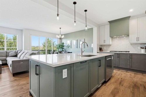 129 Wolf Hollow Villas Se, Calgary, AB - Indoor Photo Showing Kitchen With Upgraded Kitchen