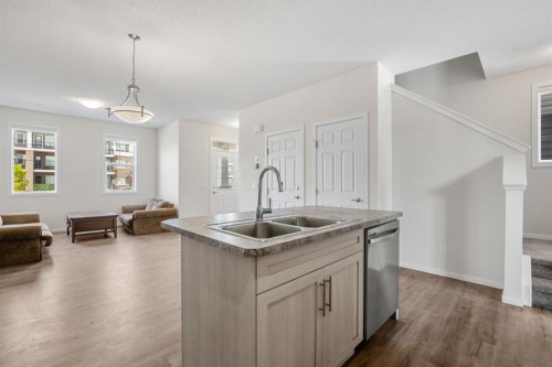 61 Cityline Gate Ne, Calgary, AB - Indoor Photo Showing Kitchen With Double Sink