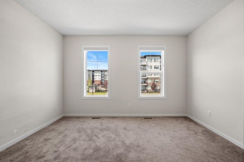 61 Cityline Gate Ne, Calgary, AB - Indoor Photo Showing Other Room