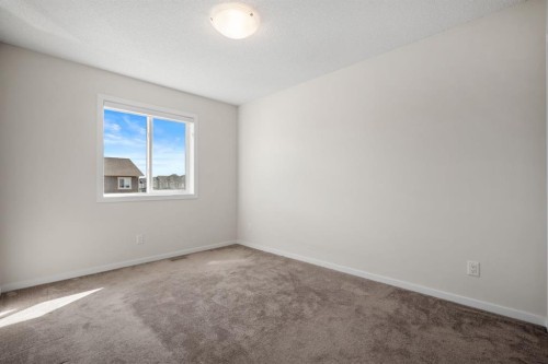 61 Cityline Gate Ne, Calgary, AB - Indoor Photo Showing Other Room