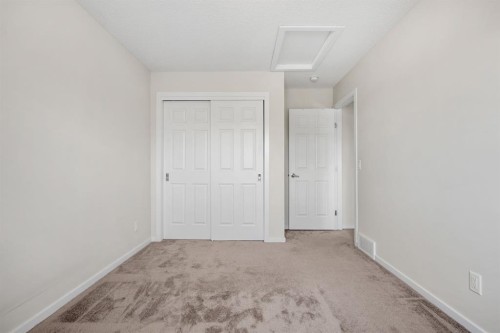 61 Cityline Gate Ne, Calgary, AB - Indoor Photo Showing Other Room